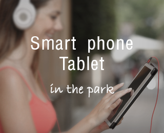 Smart phone Tablet in the park